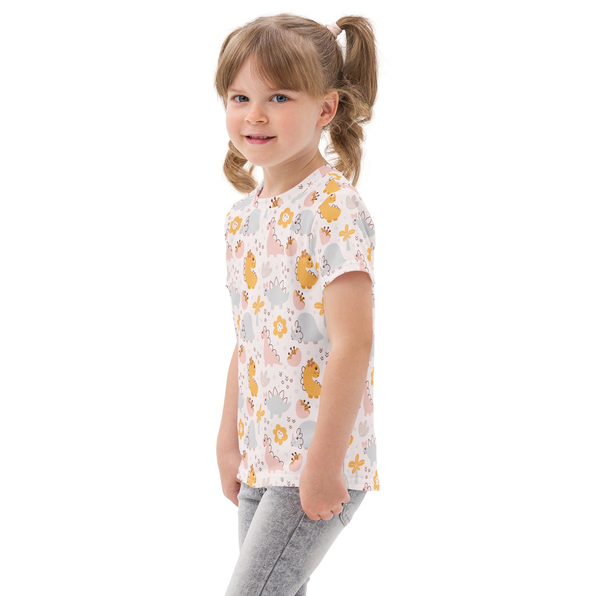 Girls floral dinosaur cotton t-shirt in white with cartoon dinosaur flower and cloud pattern in soft yellow pink and gray tones