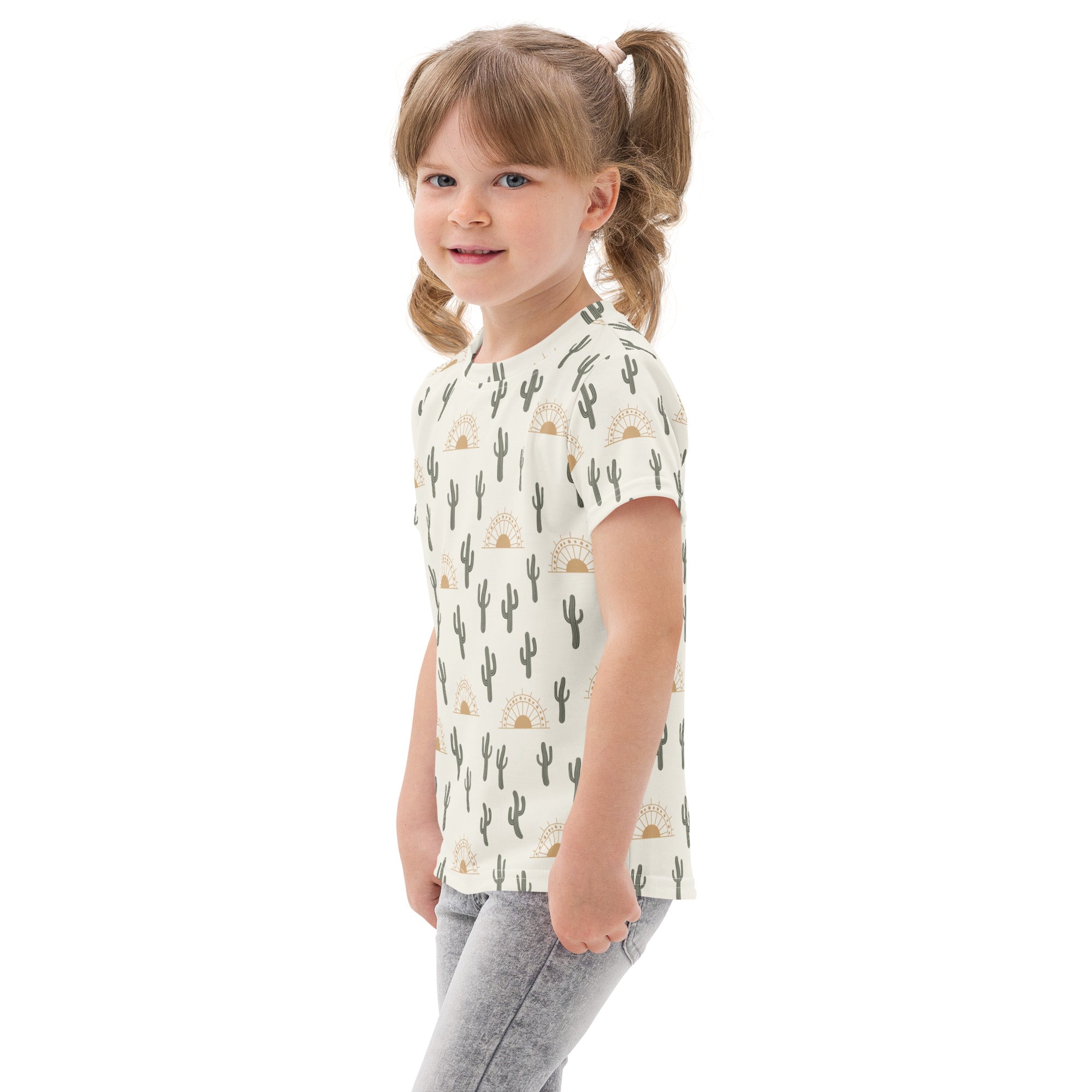 Kids cactus desert sunrise cotton t-shirt in cream with black cacti and gold sun patterns on soft short-sleeved fabric