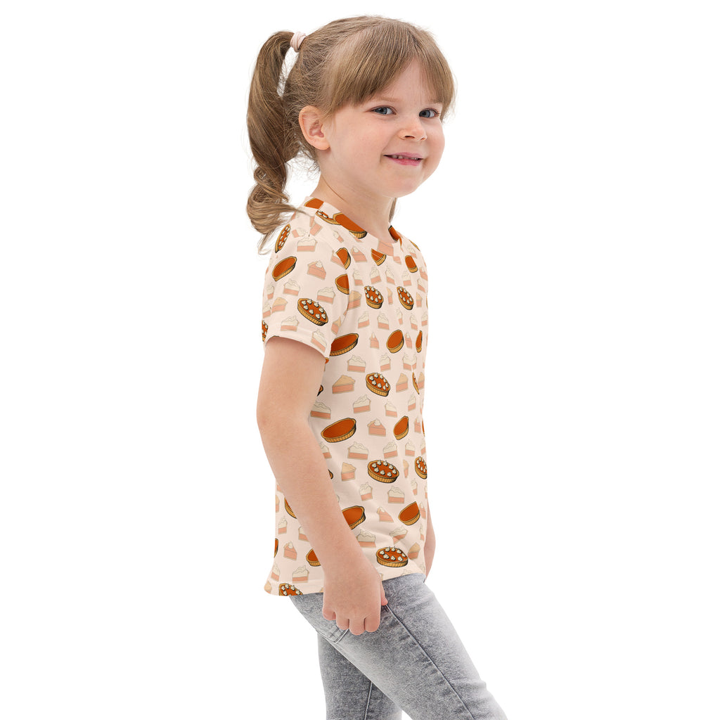 Kids pumpkin pie thanksgiving cotton t-shirt with short sleeves and playful orange brown pie and cupcake pattern on off-white
