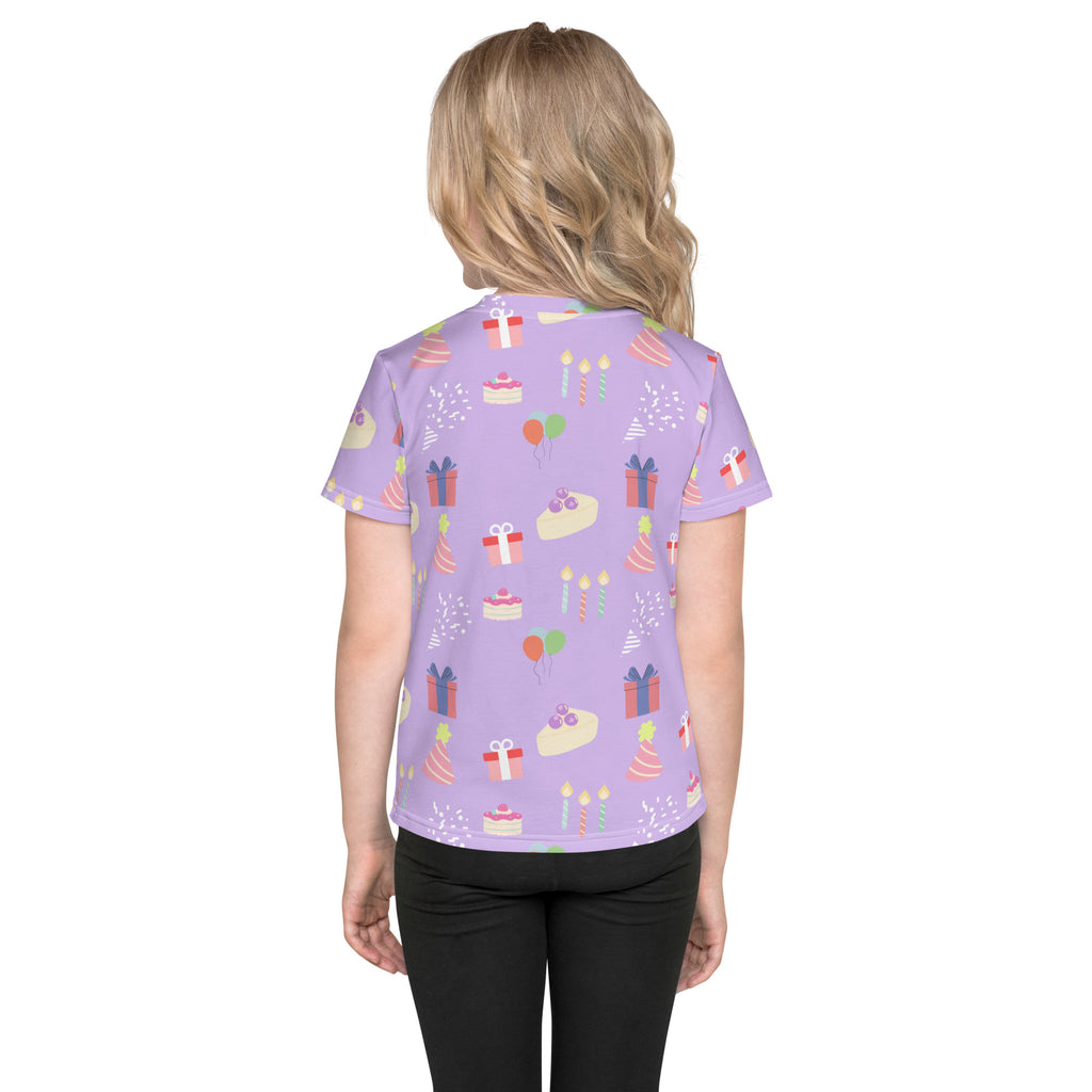 Girls birthday pattern t-shirt with playful birthday cake gift and balloon print on a lavender short-sleeved shirt