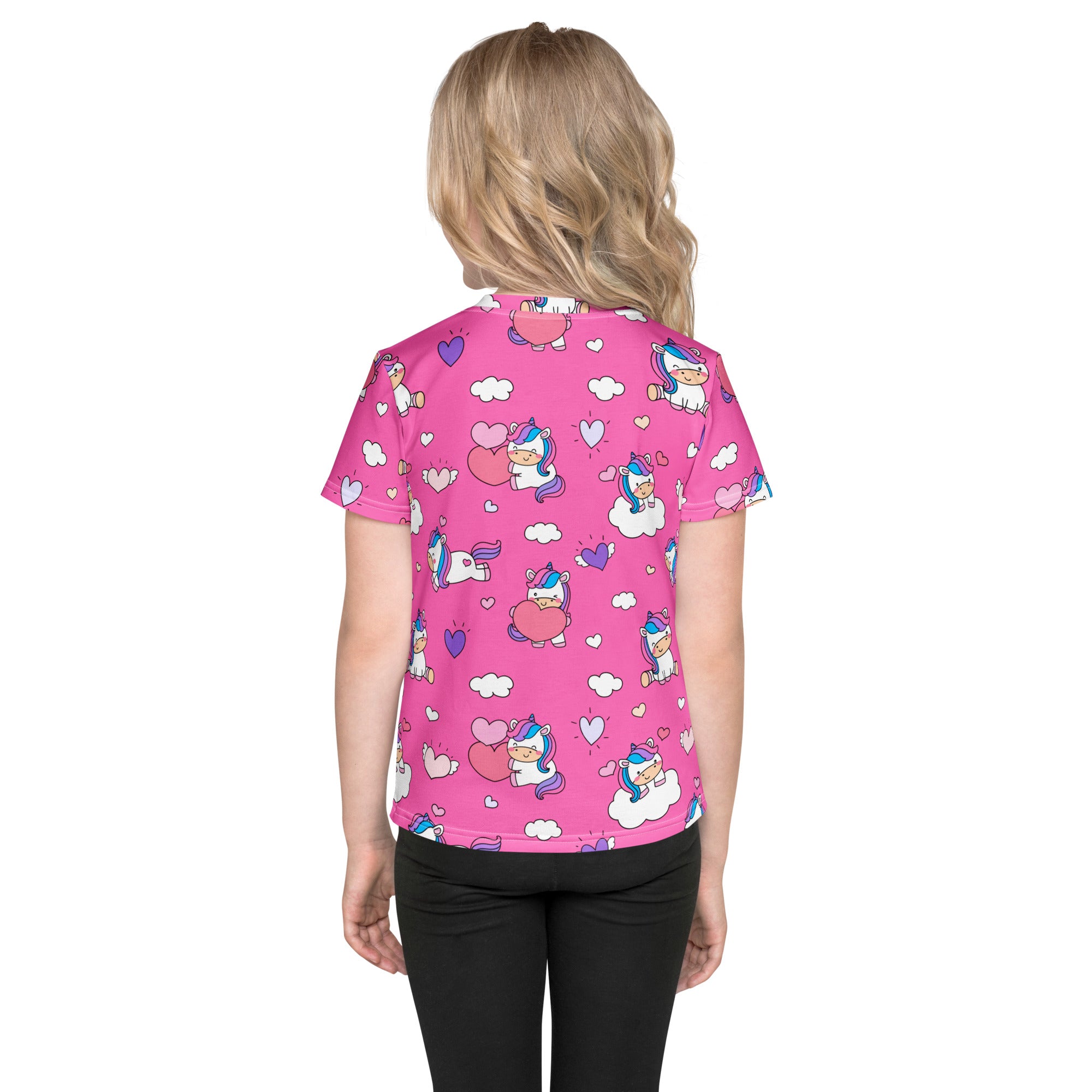 Girls pink short-sleeved t-shirt with a playful cartoon unicorn hearts and clouds pattern for casual wear