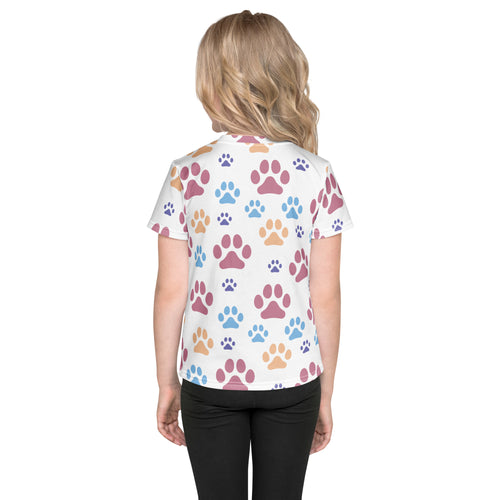 White girls short-sleeved t-shirt with colorful pink blue and orange paw prints playful pattern
