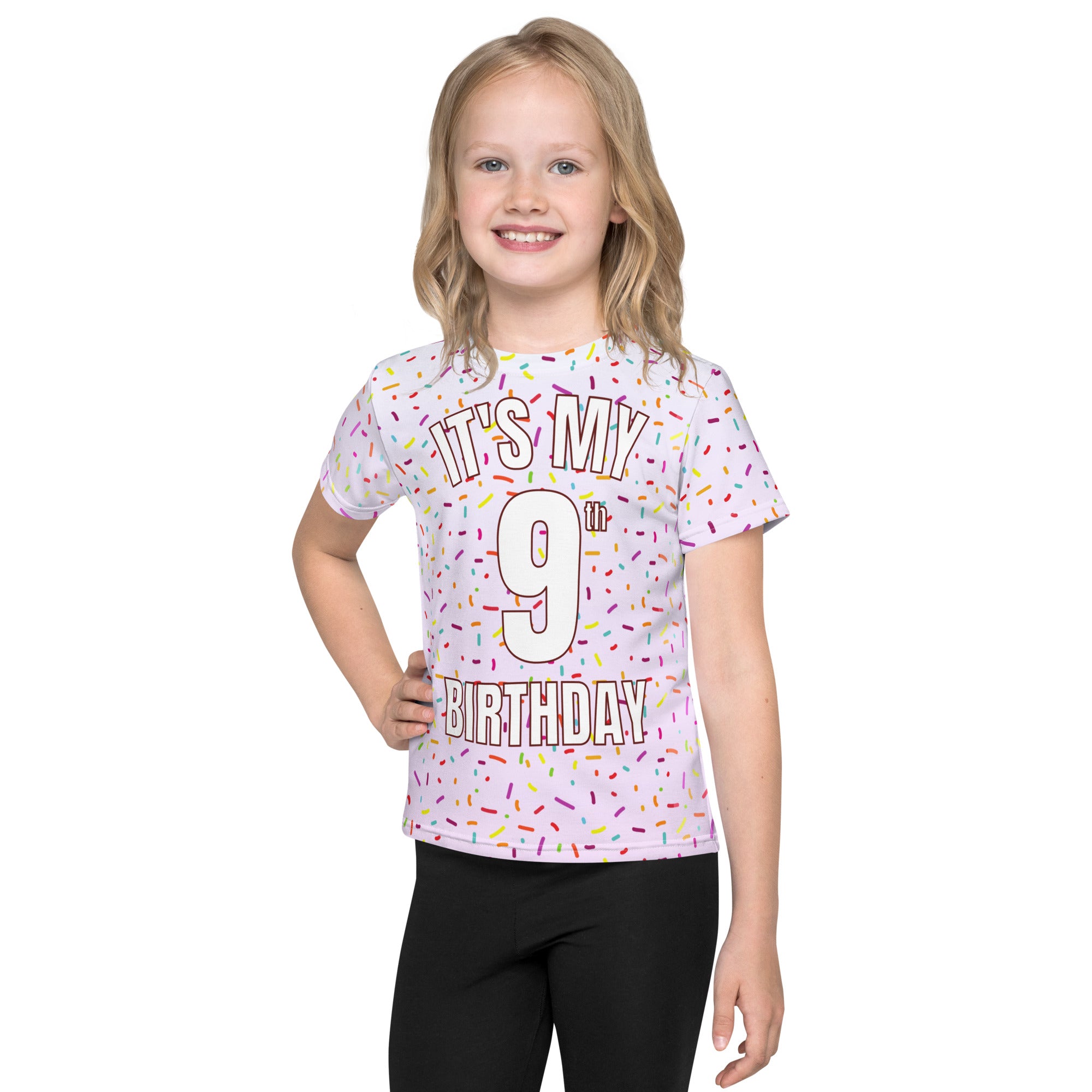 A white girls short-sleeved t-shirt with colorful sprinkles and it’s my 9th birthday bold text print