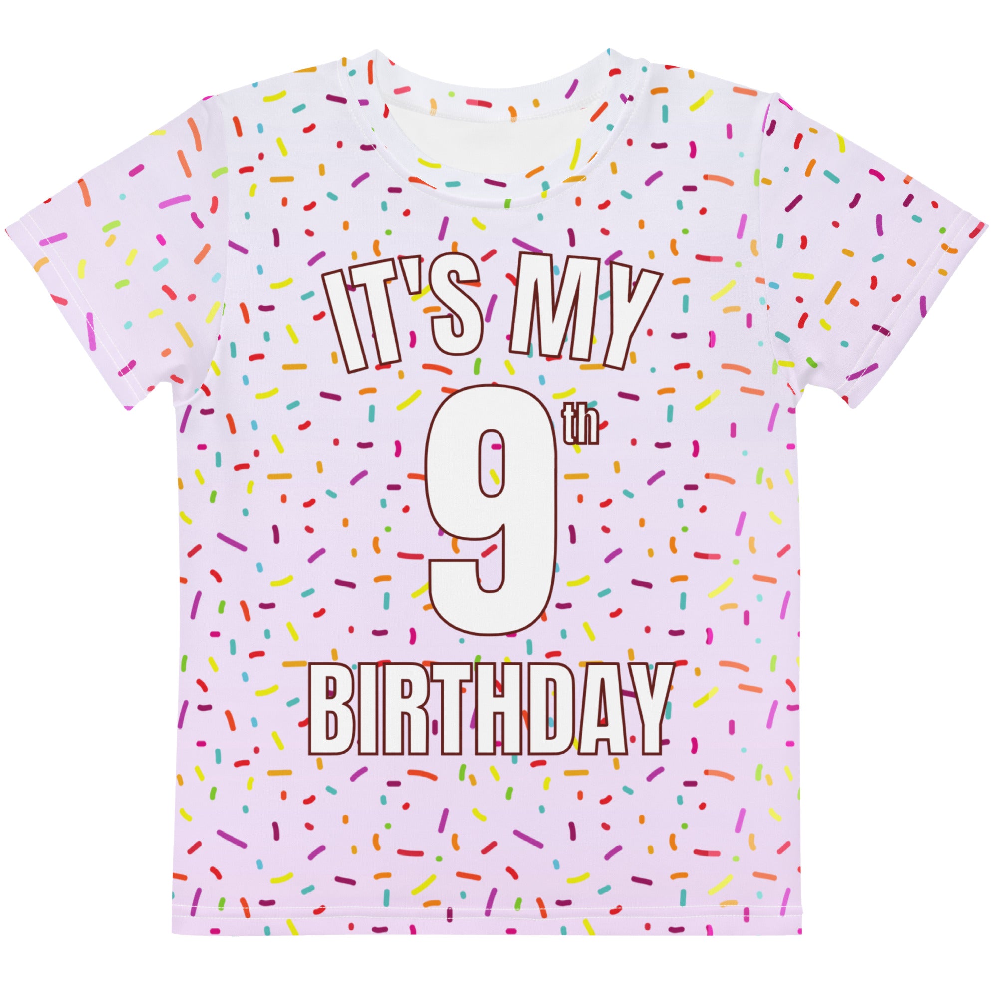 A pink short-sleeved girls t-shirt with colorful sprinkles and it is my 9th birthday text in bold white letters