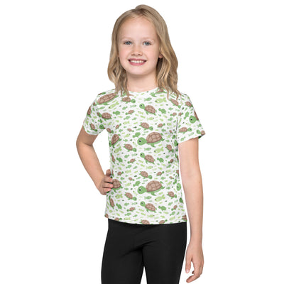 Kids green sea turtles t-shirt featuring a white short-sleeved cotton tee with playful cartoon turtle print