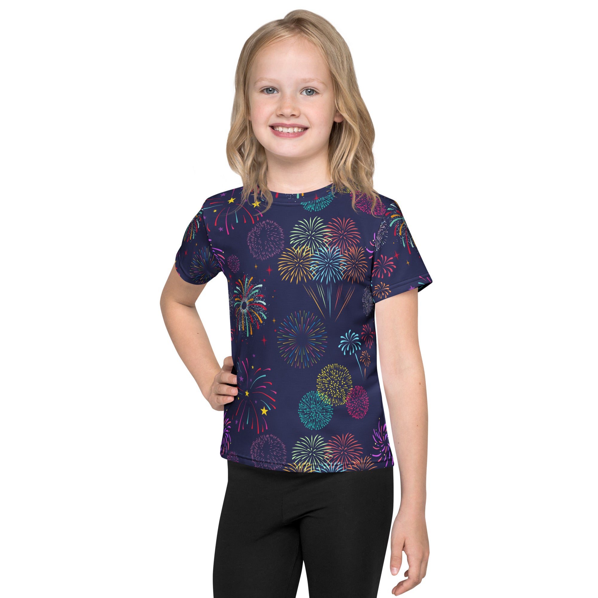 A navy blue kids short-sleeved t-shirt with a vibrant colorful fireworks print in pink green yellow and purple