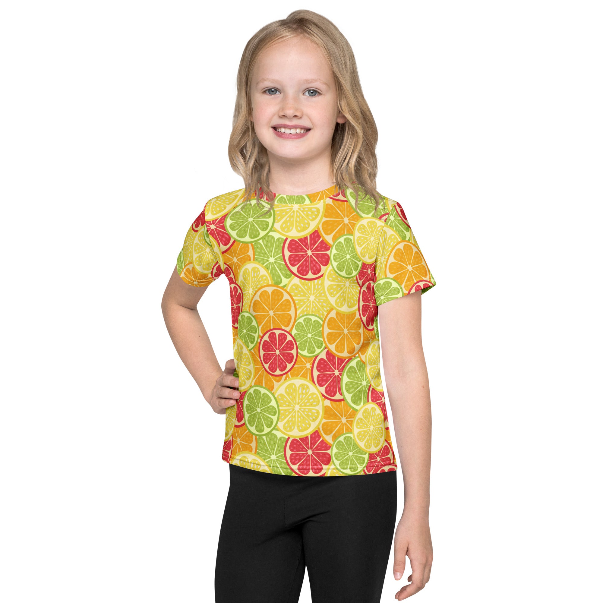 A vibrant yellow kids citrus fruit t-shirt with playful sliced green orange and red citrus patterns on short sleeves