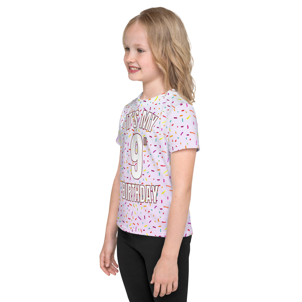 White short-sleeved t-shirt with colorful sprinkles and bold outlined its my 9th birthday text for girls birthday