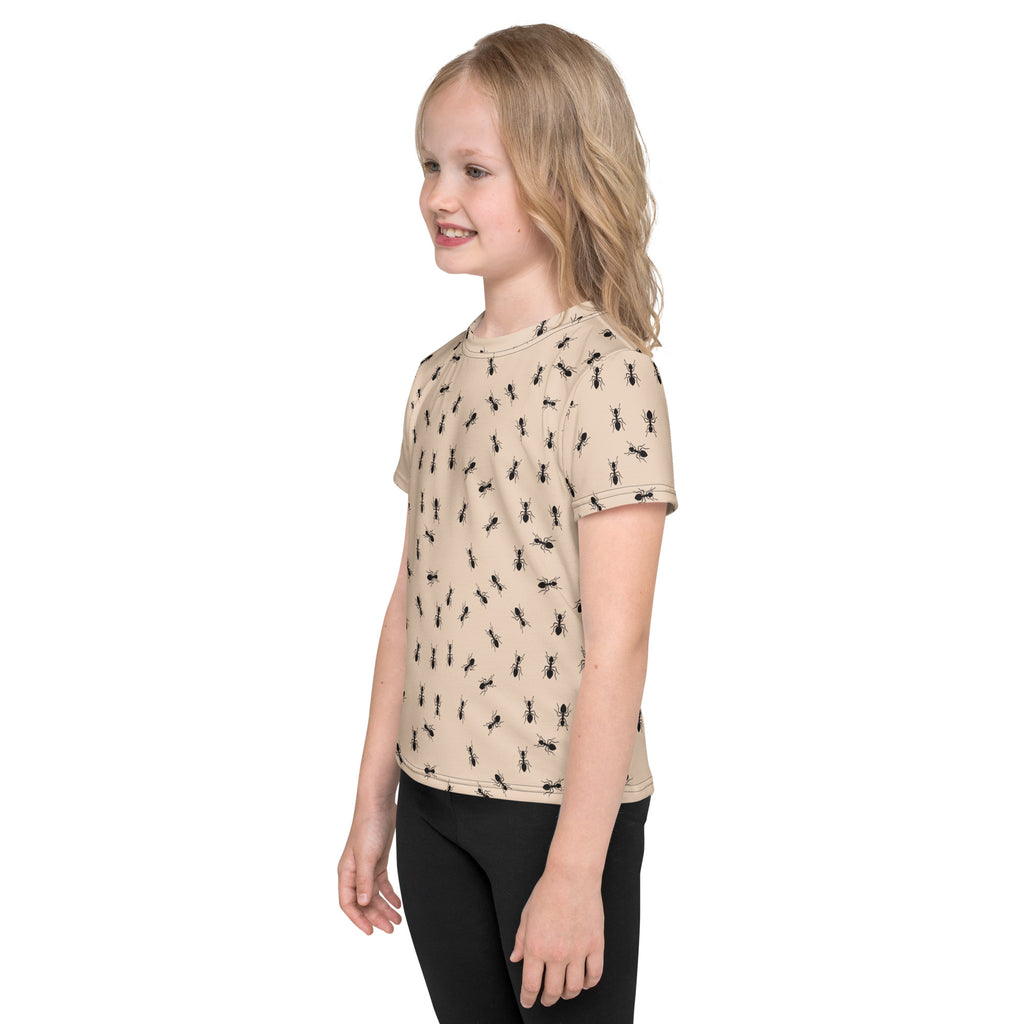 Beige kids short-sleeved t-shirt with a repeating black ant print perfect for casual wear