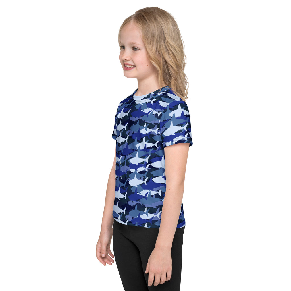 Kids blue shark t-shirt featuring a blue and white shark pattern on short-sleeve cotton fabric for casual wear