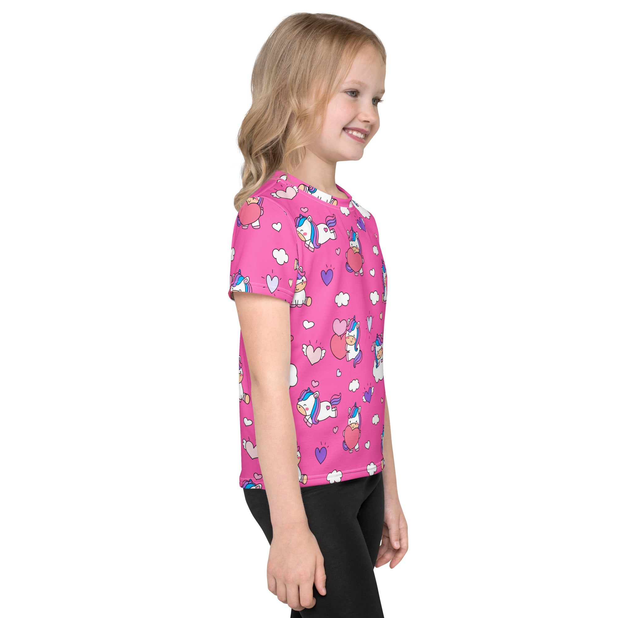 Girls pink short-sleeved cotton t-shirt featuring a playful unicorn and heart pattern for casual wear