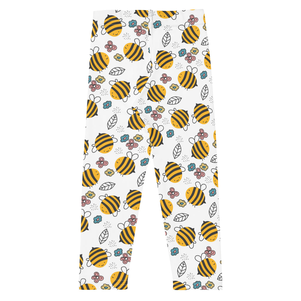 Kids white leggings with cute bee, flower, and leaf print, playful children's clothing