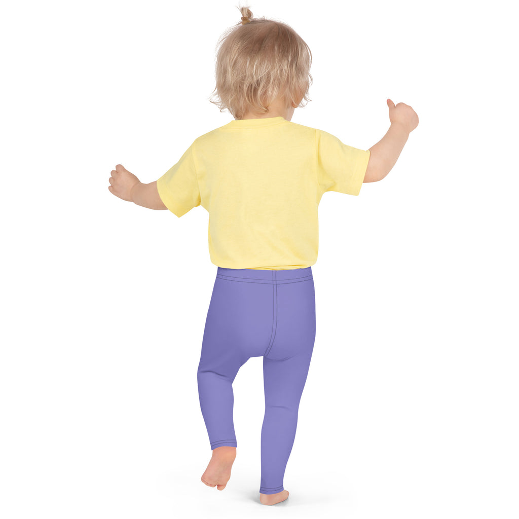 Toddler wearing bright yellow t-shirt and buttery soft purple leggings made of form-fitting comfortable fabric