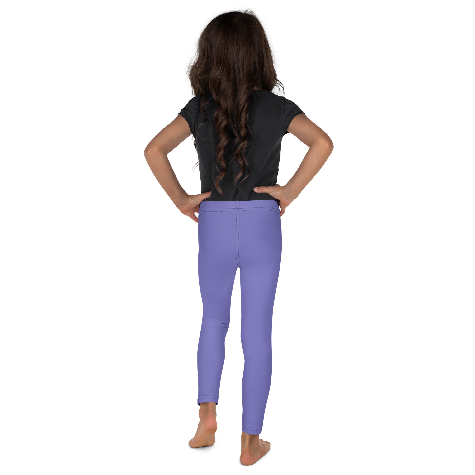 Girls buttery soft purple leggings worn by a child showcasing stretchy and comfortable fabric fit for active wear