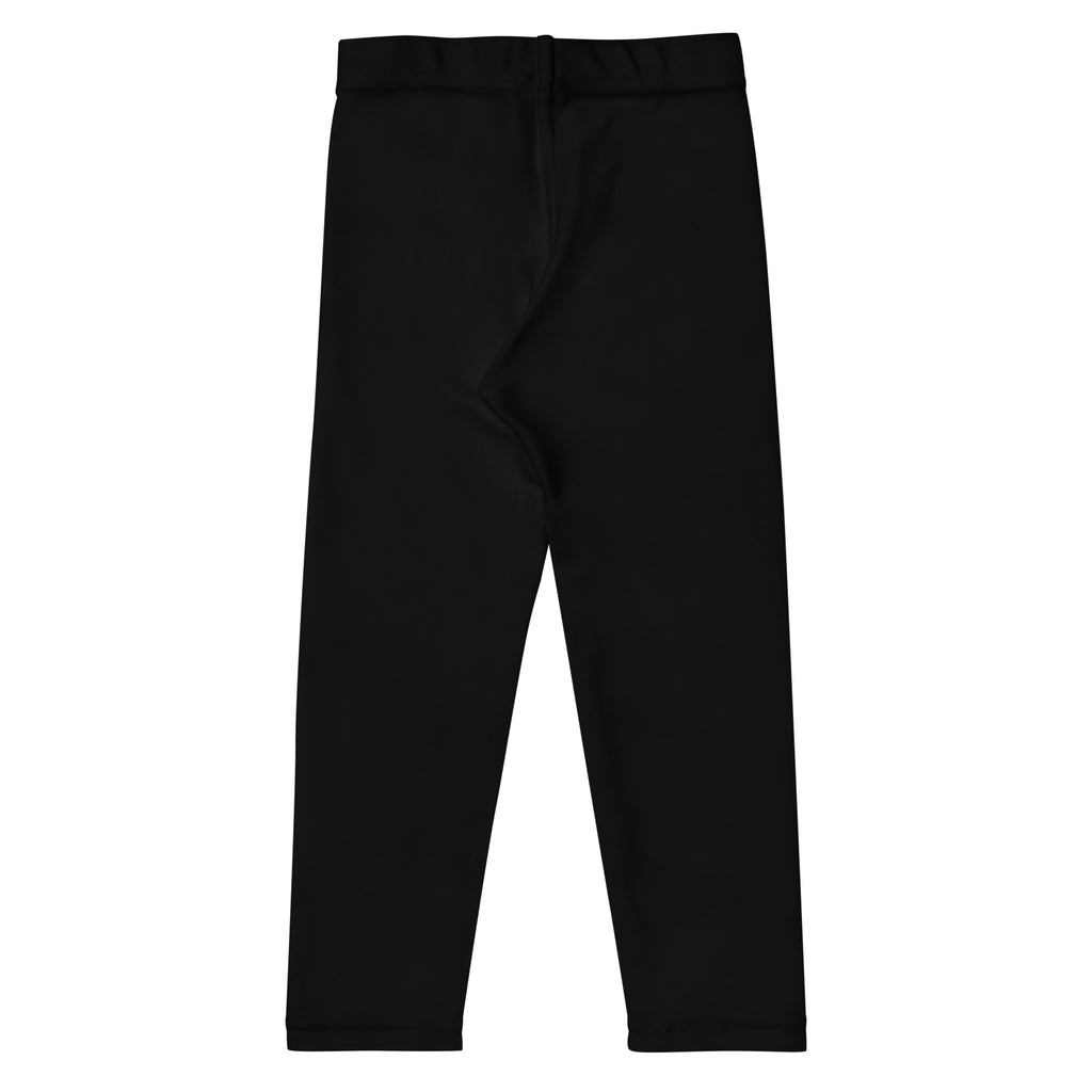 Kids buttery soft black leggings featuring sleek fitting fabric with elastic waistband and smooth buttery texture