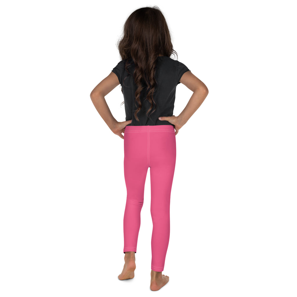 Girls buttery soft pink leggings bright pink form-fitting buttery soft fabric worn by a child