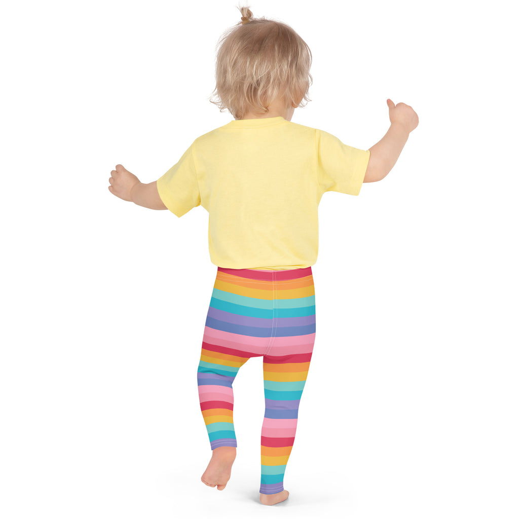 Girls bright rainbow striped buttery soft leggings worn by a child showcasing colorful comfortable fit