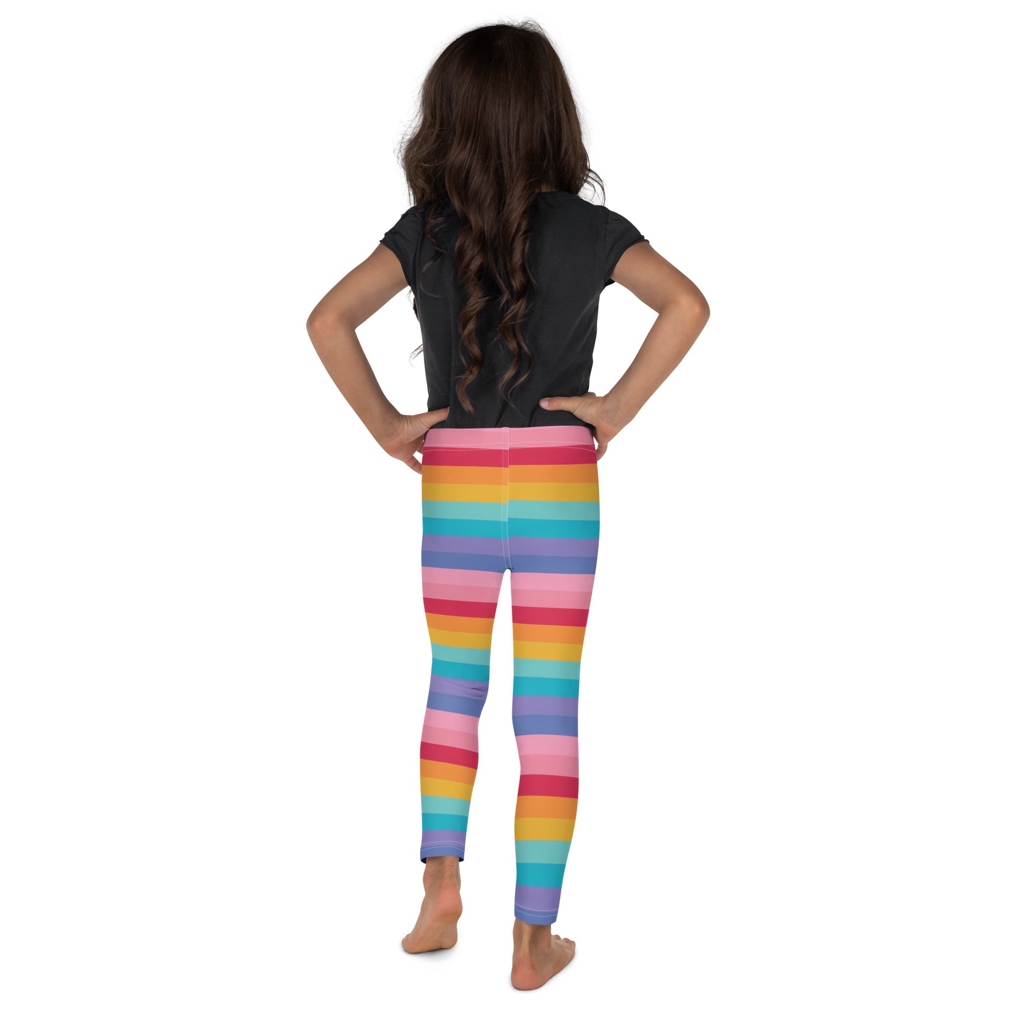 Girls bright rainbow striped buttery soft leggings with vibrant pink orange yellow green blue and purple bands