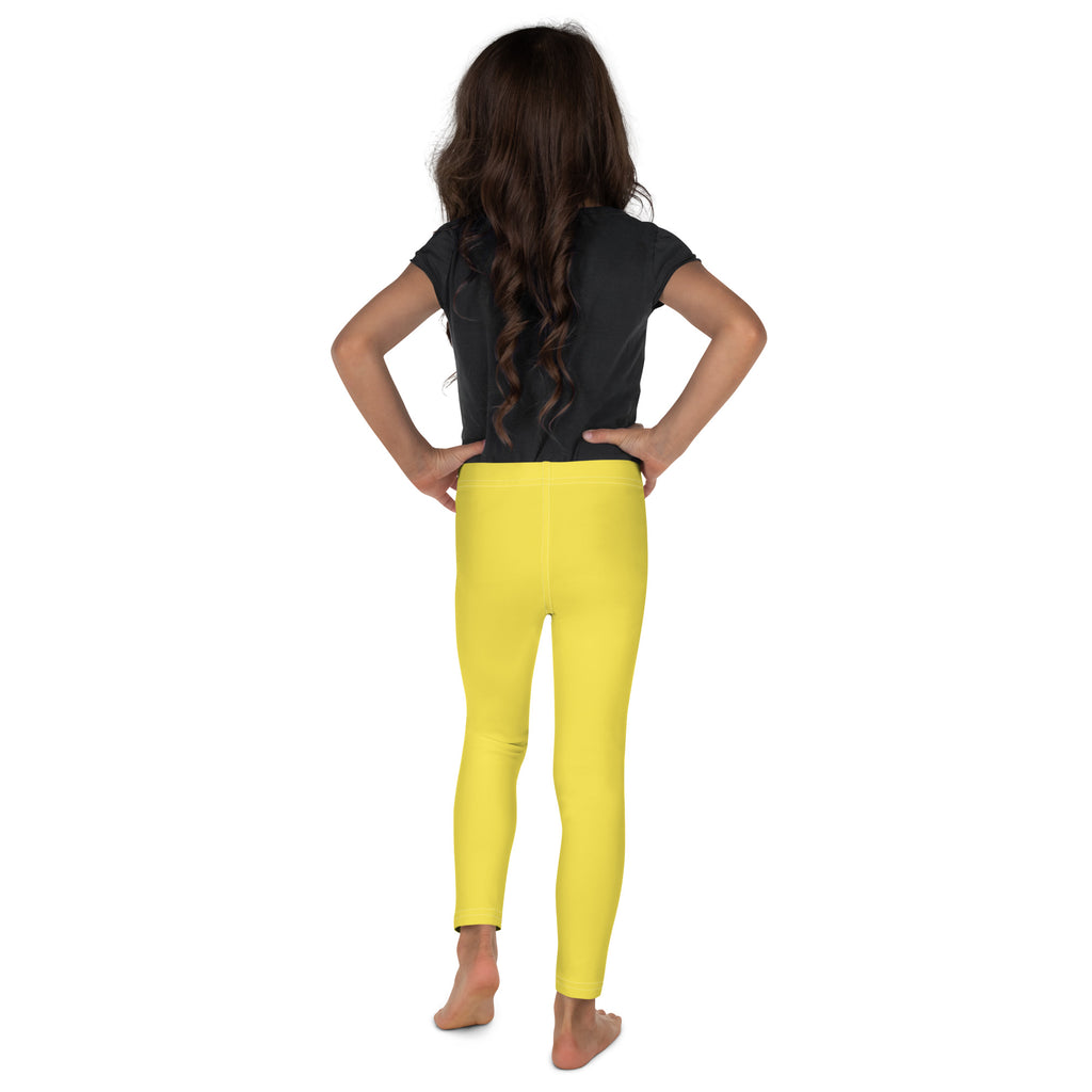 Bright yellow kids buttery soft leggings shown from the back in a form-fitting comfortable style