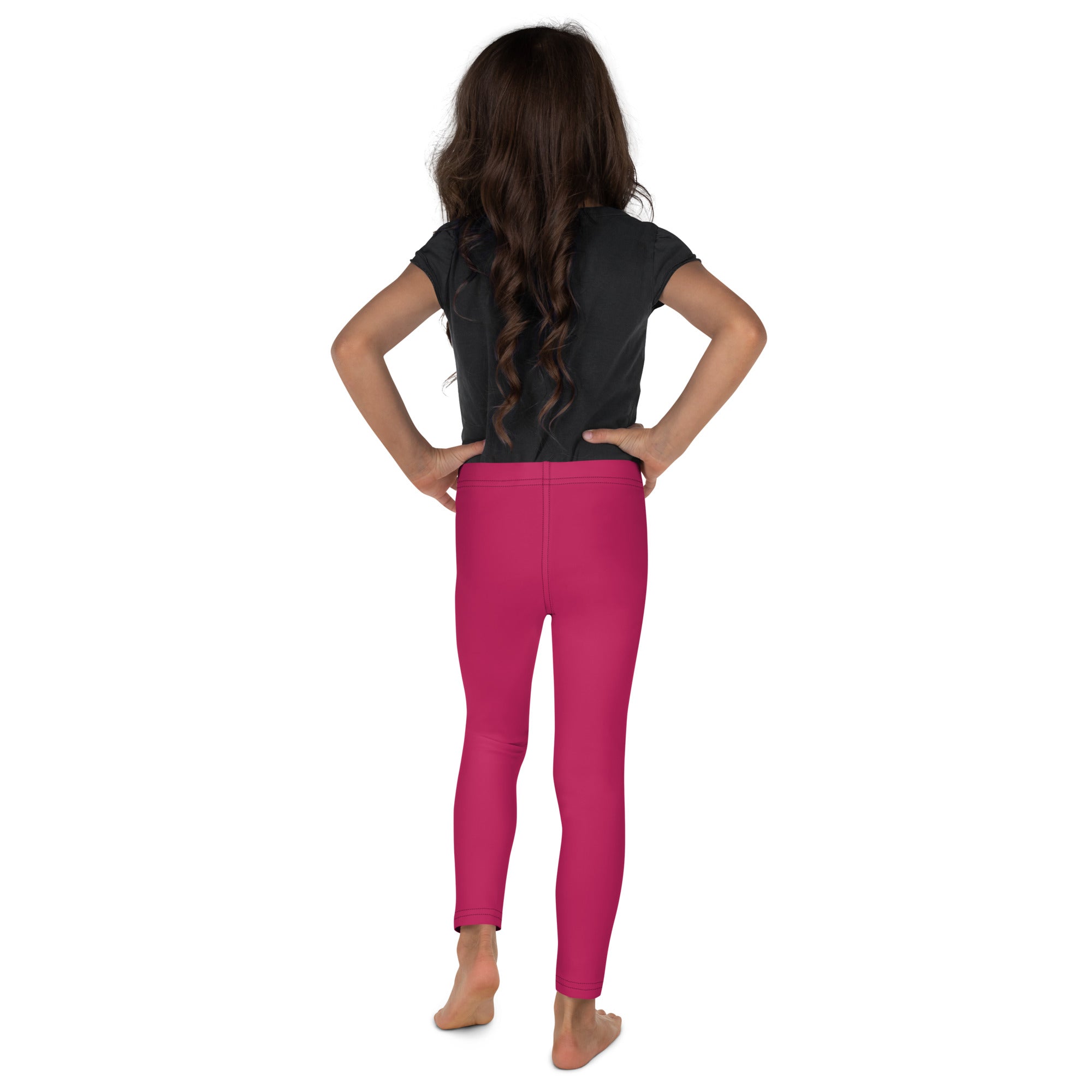 Girls buttery soft rose red leggings worn by child with long dark hair in fuchsia form-fitting style