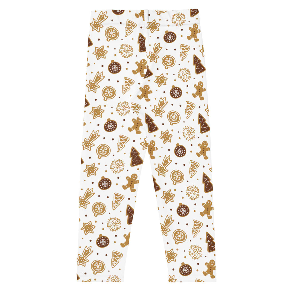 Kids gingerbread christmas leggings in white buttery soft fabric with festive brown gingerbread men trees and stars pattern
