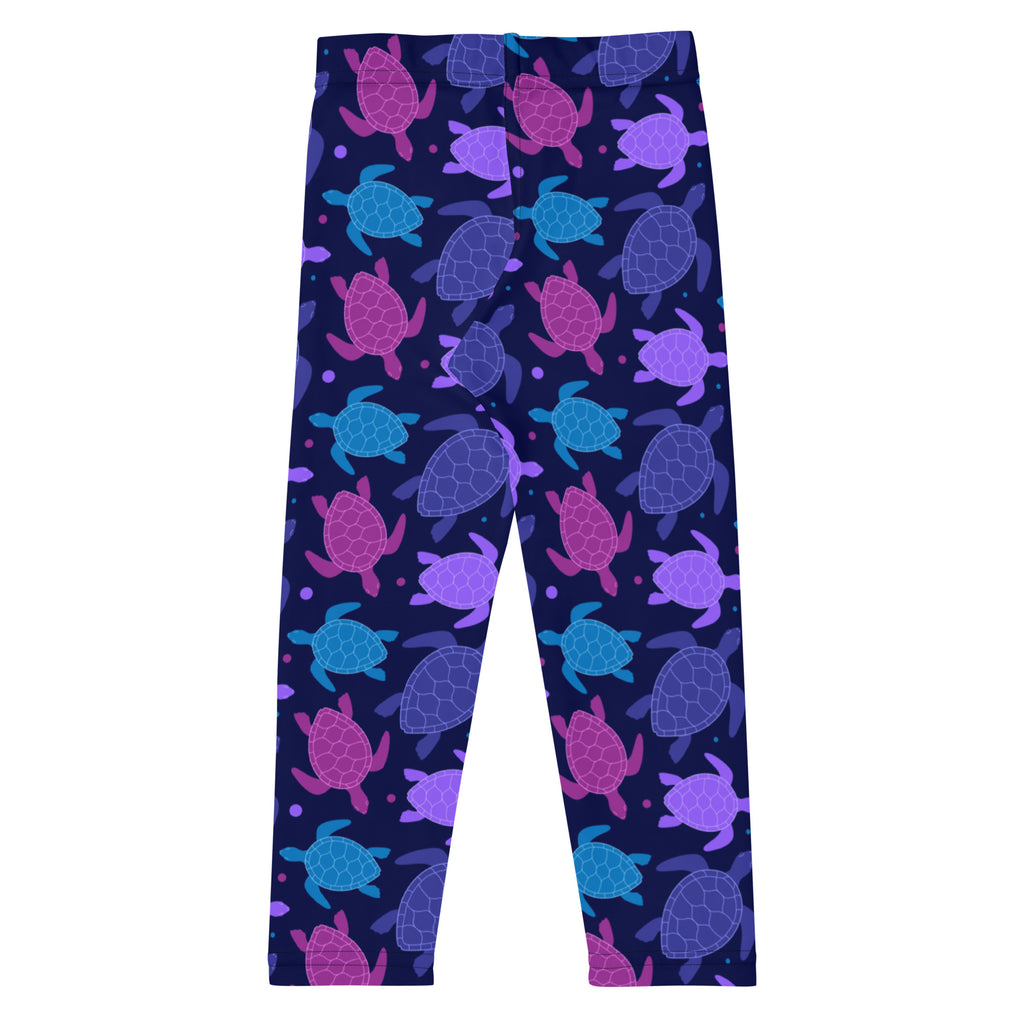 Girls purple sea turtle leggings with blue pattern on dark navy background made from buttery soft fabric