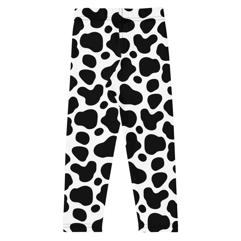 Kids cow print buttery soft leggings featuring black and white cow pattern in a comfortable stretchy fabric