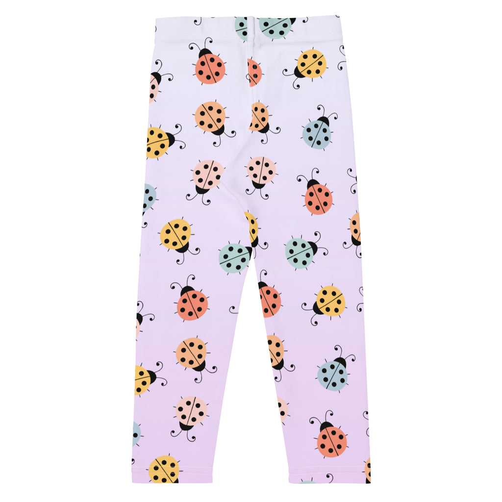 Girls colorful ladybug buttery soft leggings in pastel lavender with playful orange yellow and teal ladybug pattern