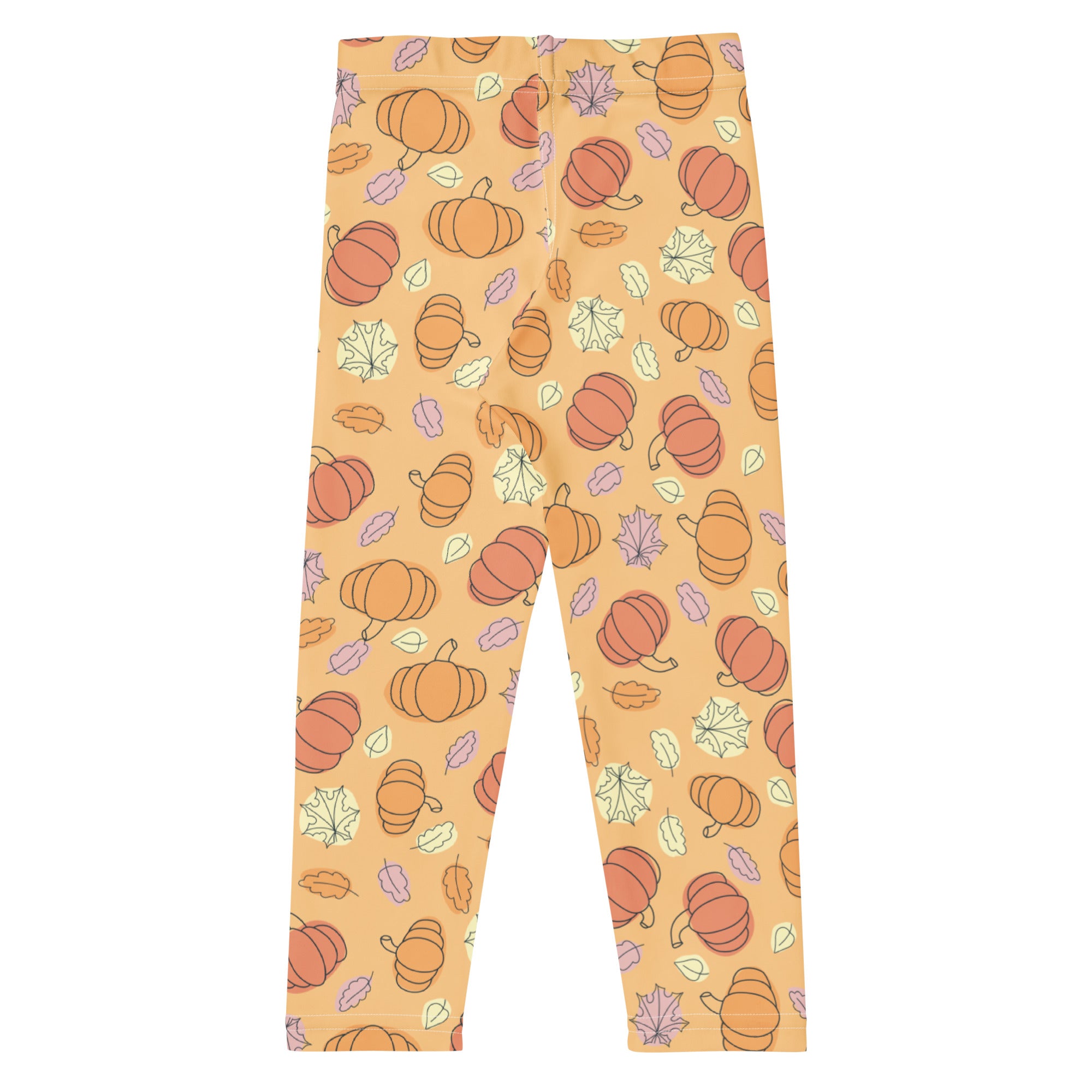 Kids pumpkin patch buttery soft leggings in orange pumpkin and leaf pattern on a light peach background