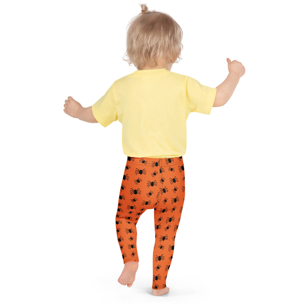 Kids orange buttery soft leggings with black spider prints perfect for Halloween dress up or everyday wear