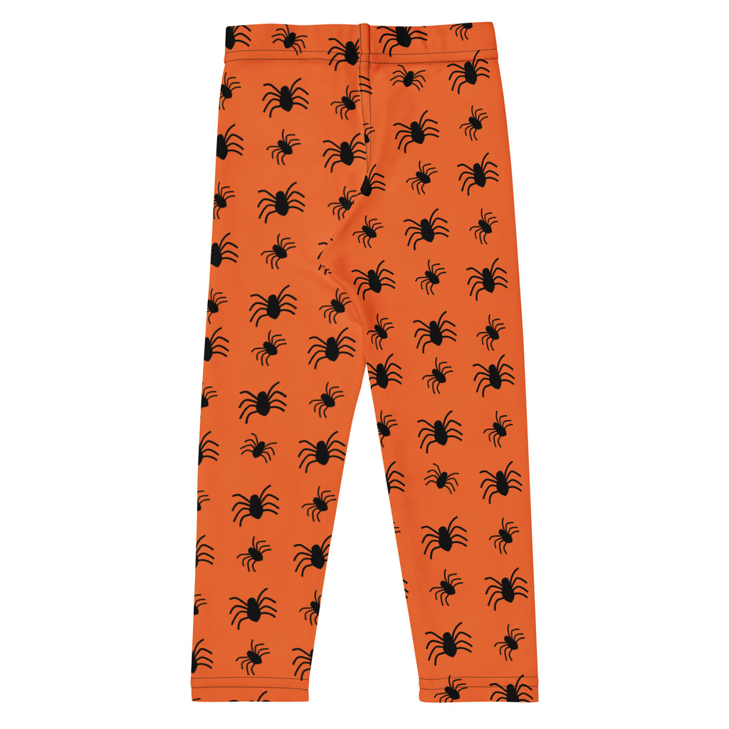 Kids orange buttery soft leggings with black spider prints perfect for halloween costume or festive wear