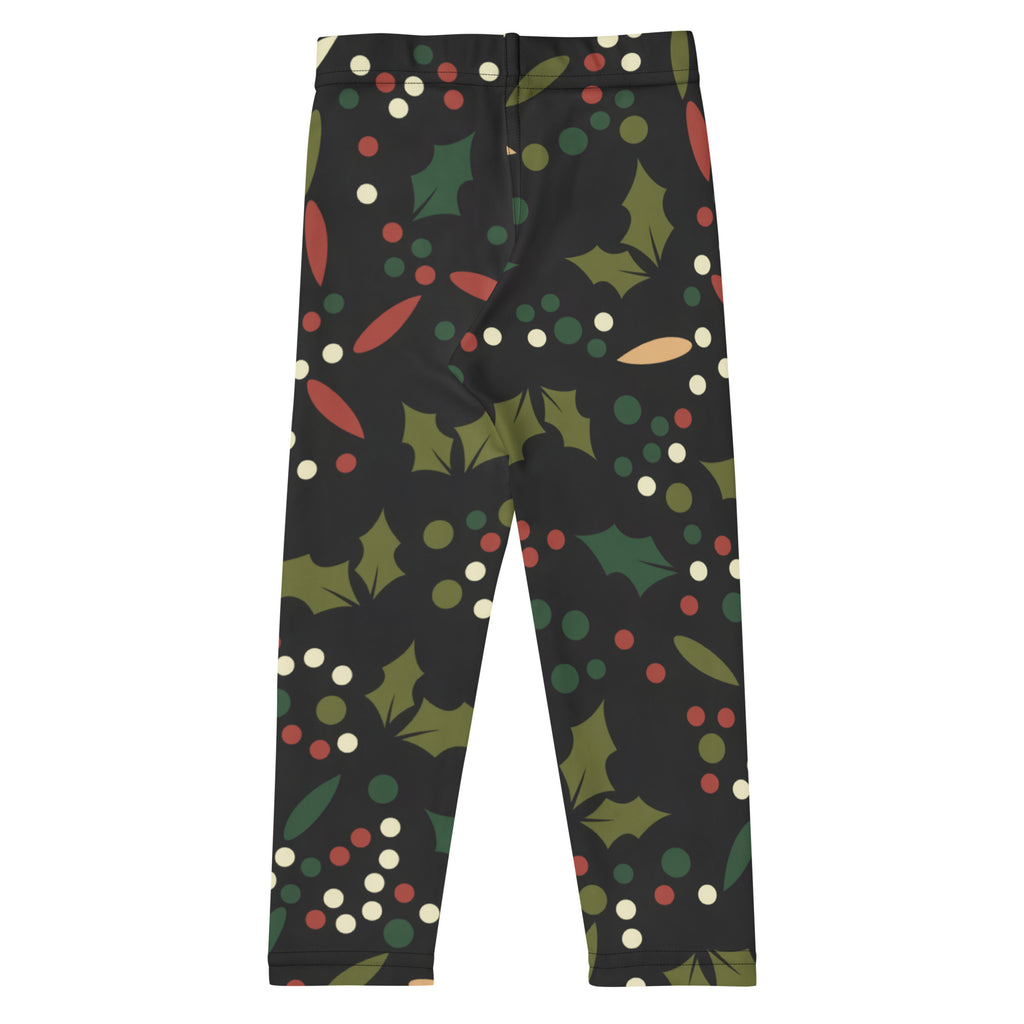 Kids holiday holly buttery soft black leggings with festive green holly leaves red berries and white olive green dots