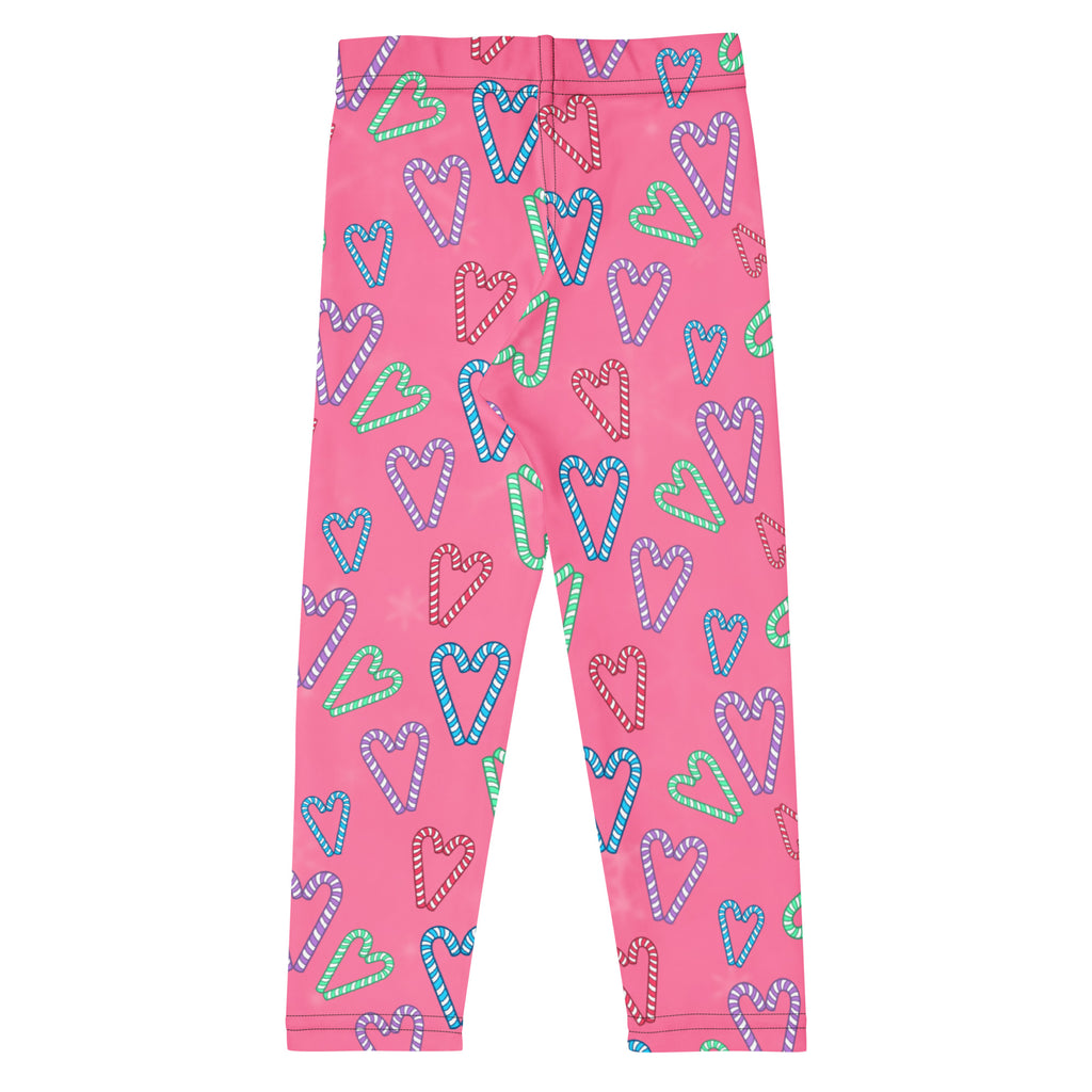Girls pink candy cane heart buttery soft leggings featuring a playful pattern of blue green and purple candy cane hearts