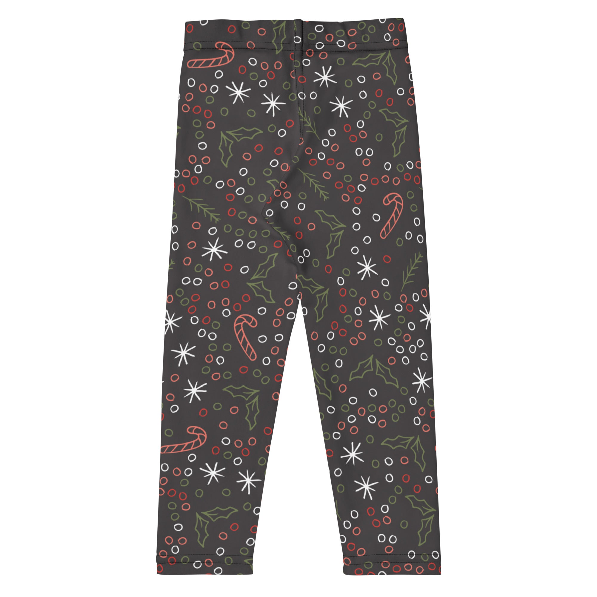 Dark gray kids Christmas leggings with buttery soft fabric featuring candy canes holly leaves snowflakes and berries