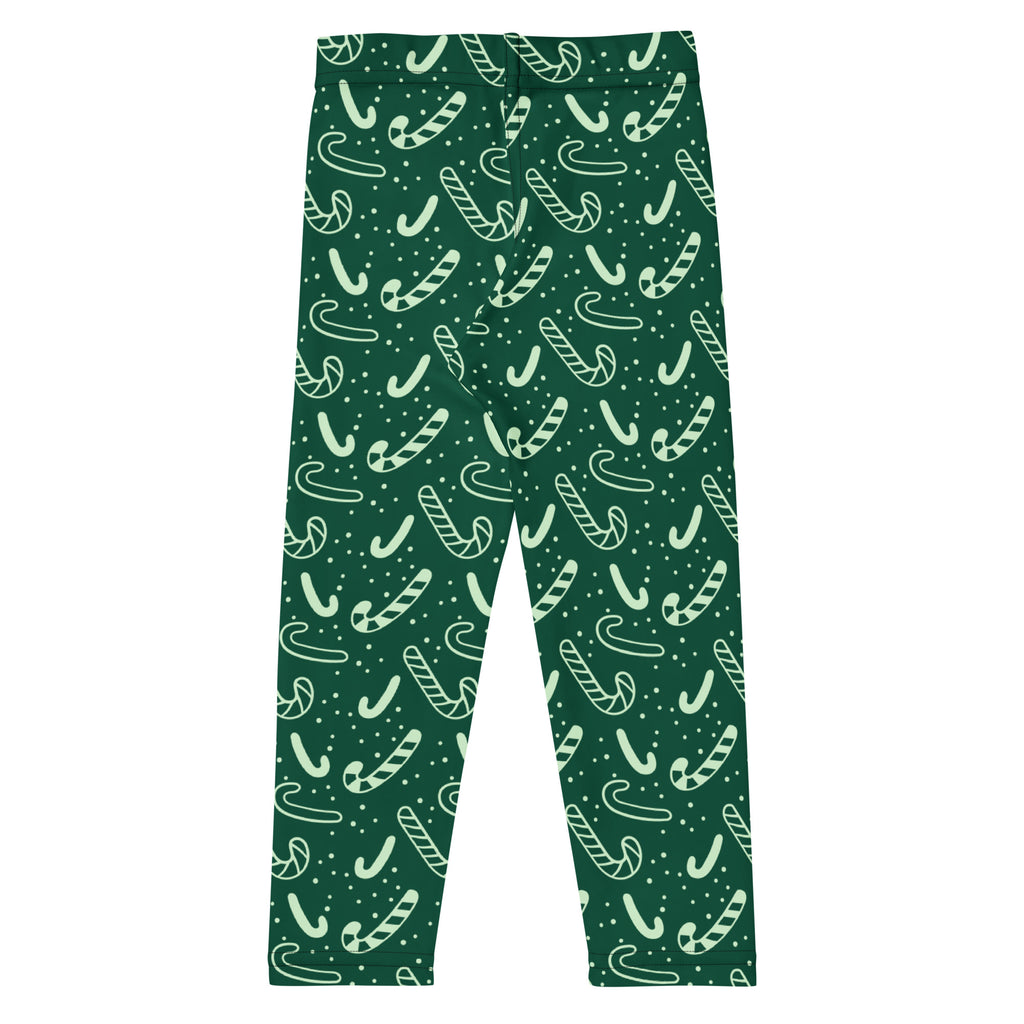 Kids green candy cane buttery soft leggings in dark green with light mint candy cane pattern and small dots