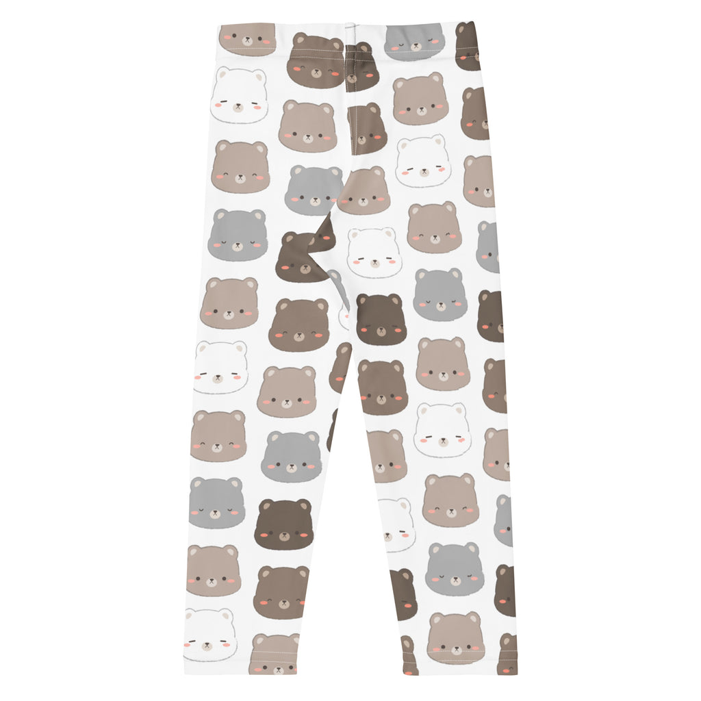 White buttery soft kids leggings with a playful bear face pattern in brown gray and white shades