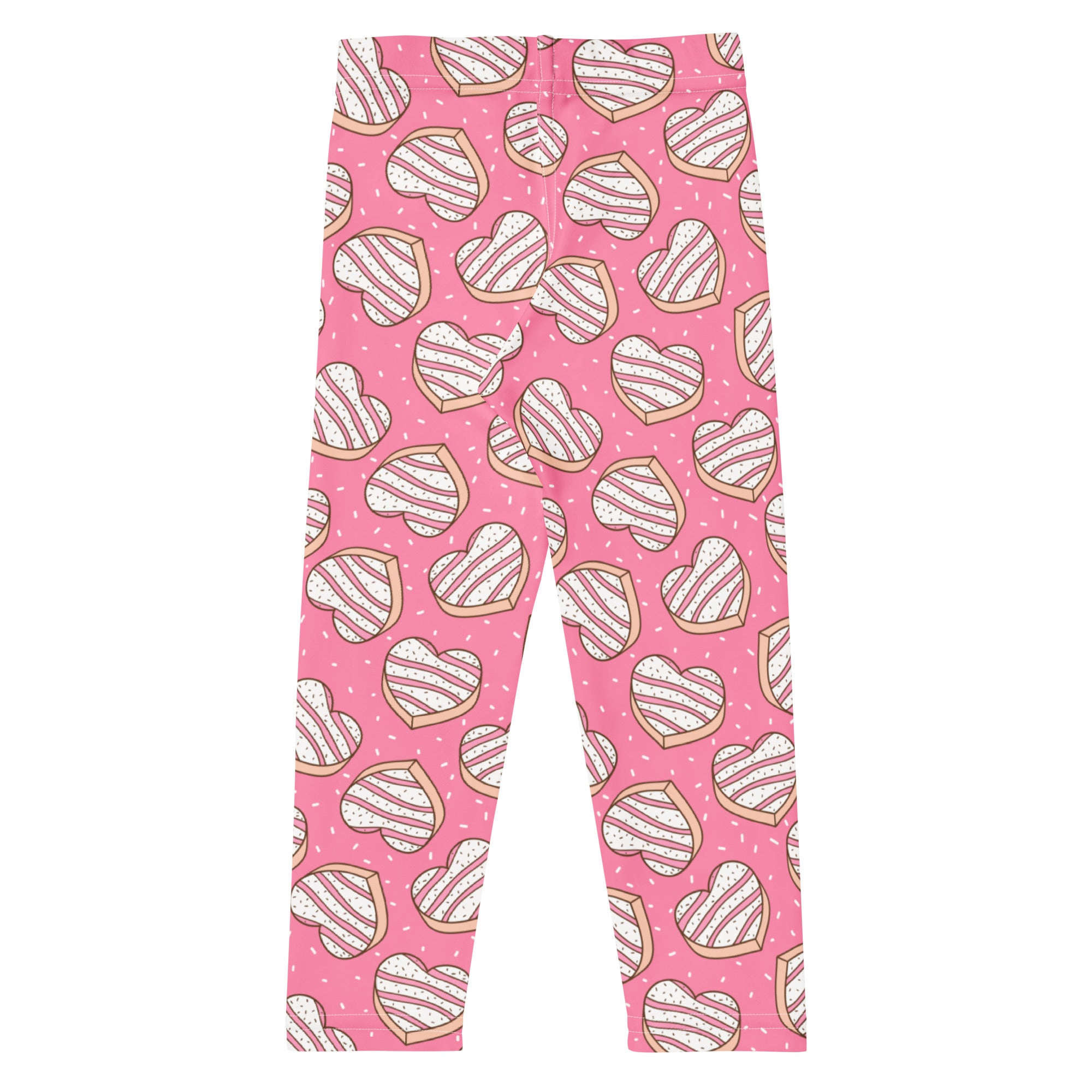 Girls pink buttery soft leggings with playful heart shaped cookie pattern featuring white icing stripes and brown outlines