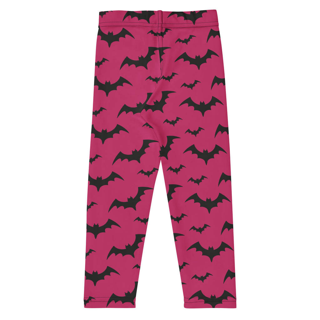 Kids pink buttery soft leggings with black bat patterns perfect for halloween wear