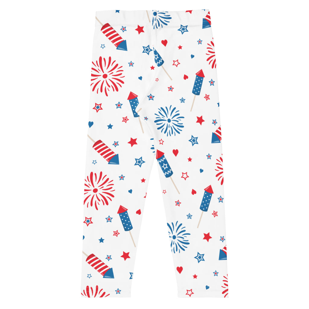 White kids leggings with a festive red and blue fireworks and rockets pattern made of buttery soft fabric