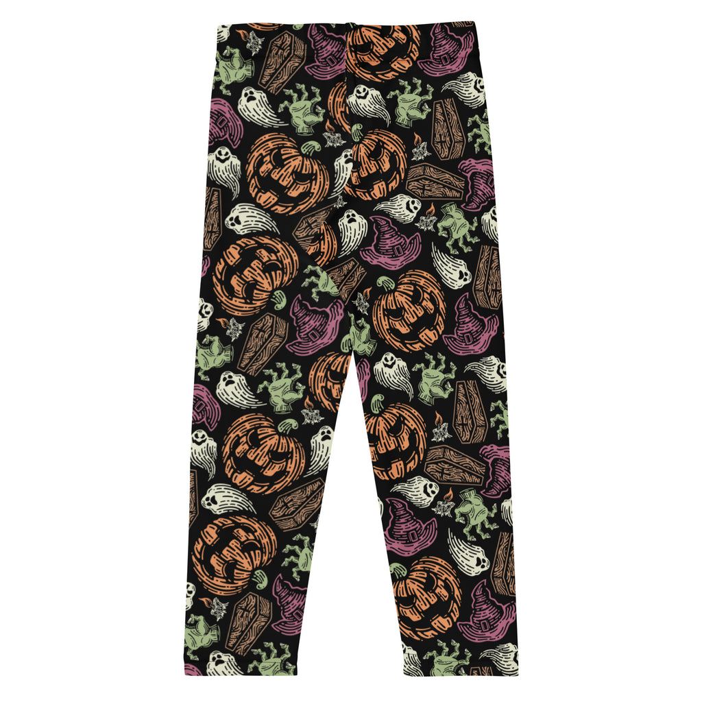 Kids creepy halloween buttery soft black leggings with vibrant orange jack o lanterns white ghosts purple witch hats and green zombies