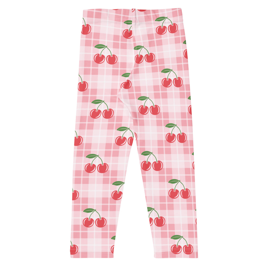Girls cherry plaid buttery soft leggings in pink with cherry print and plaid pattern for comfortable wear