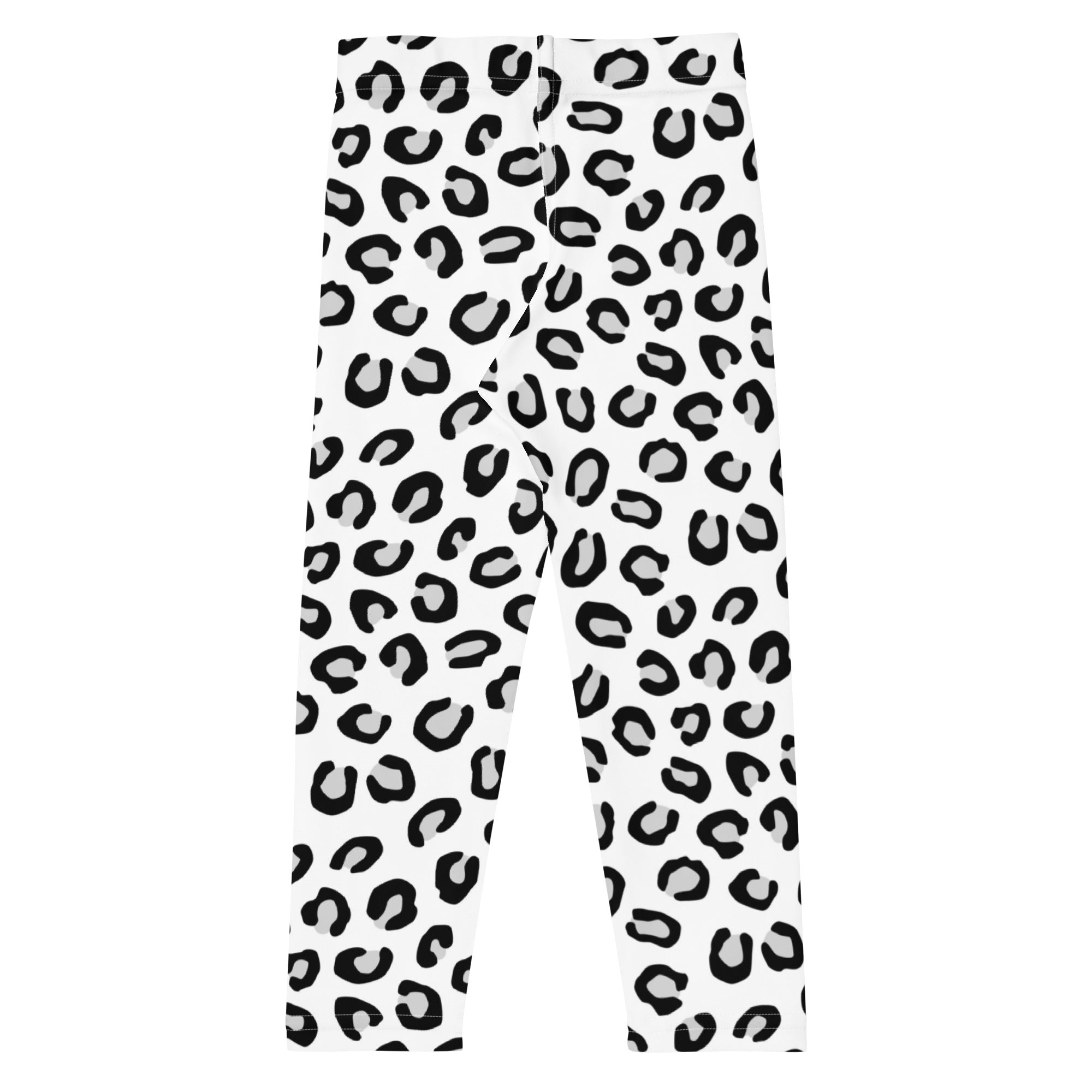 Girls black and white leopard print buttery soft leggings with bold black leopard pattern on white fabric
