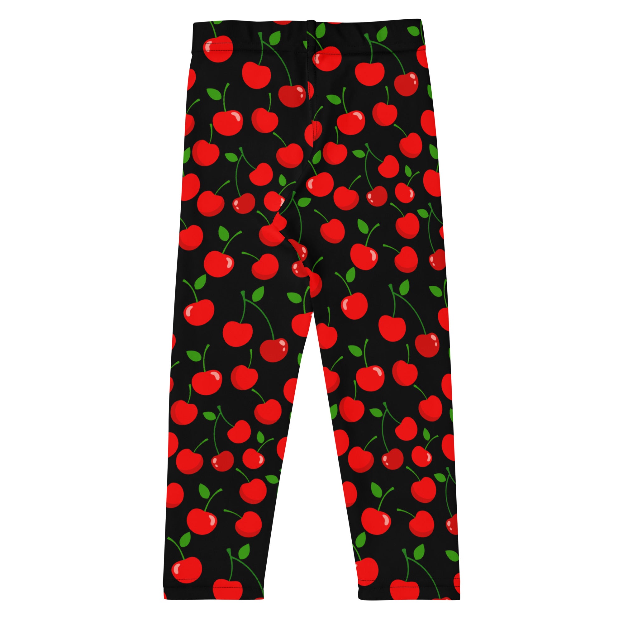 Girls black buttery soft leggings with vibrant red cherry pattern featuring green stems and leaves