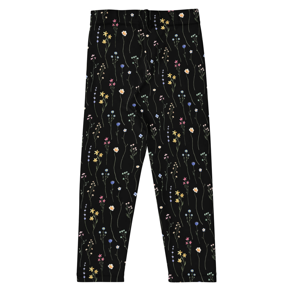 Girls black wildflower buttery soft leggings with a delicate pattern of multicolored pastel wildflowers