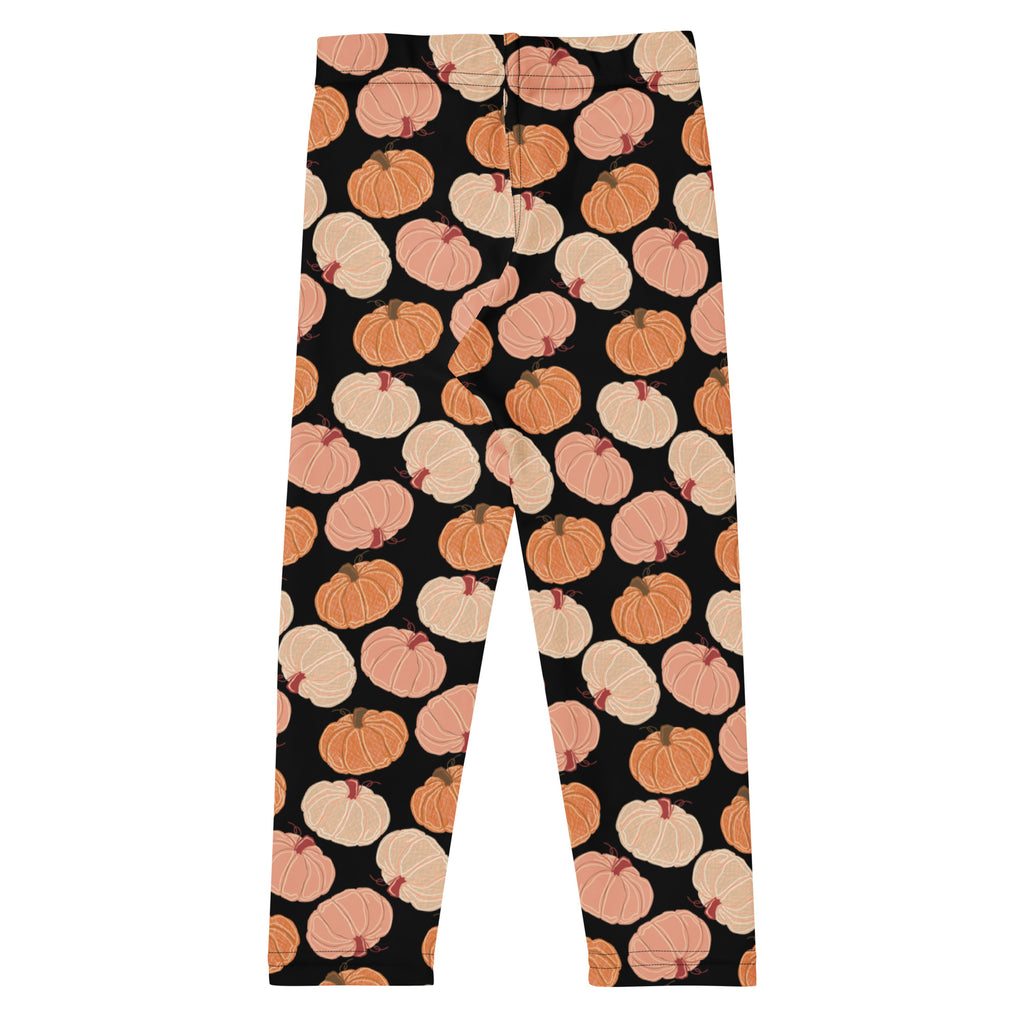 Kids fall pumpkins buttery soft black leggings with a repeating pattern of illustrated orange and cream pumpkins