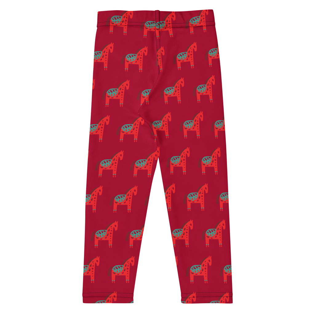 Girls scandi horse christmas buttery soft red leggings with repeating stylized red and teal horses pattern