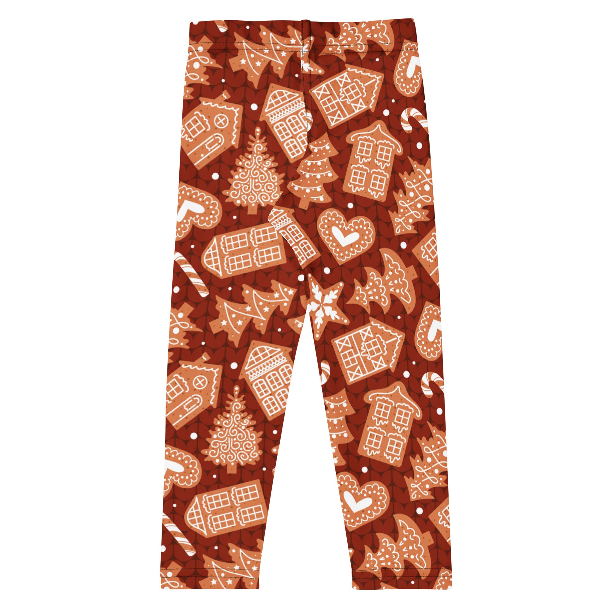 Kids red buttery soft leggings with festive gingerbread house christmas tree and candy cane pattern