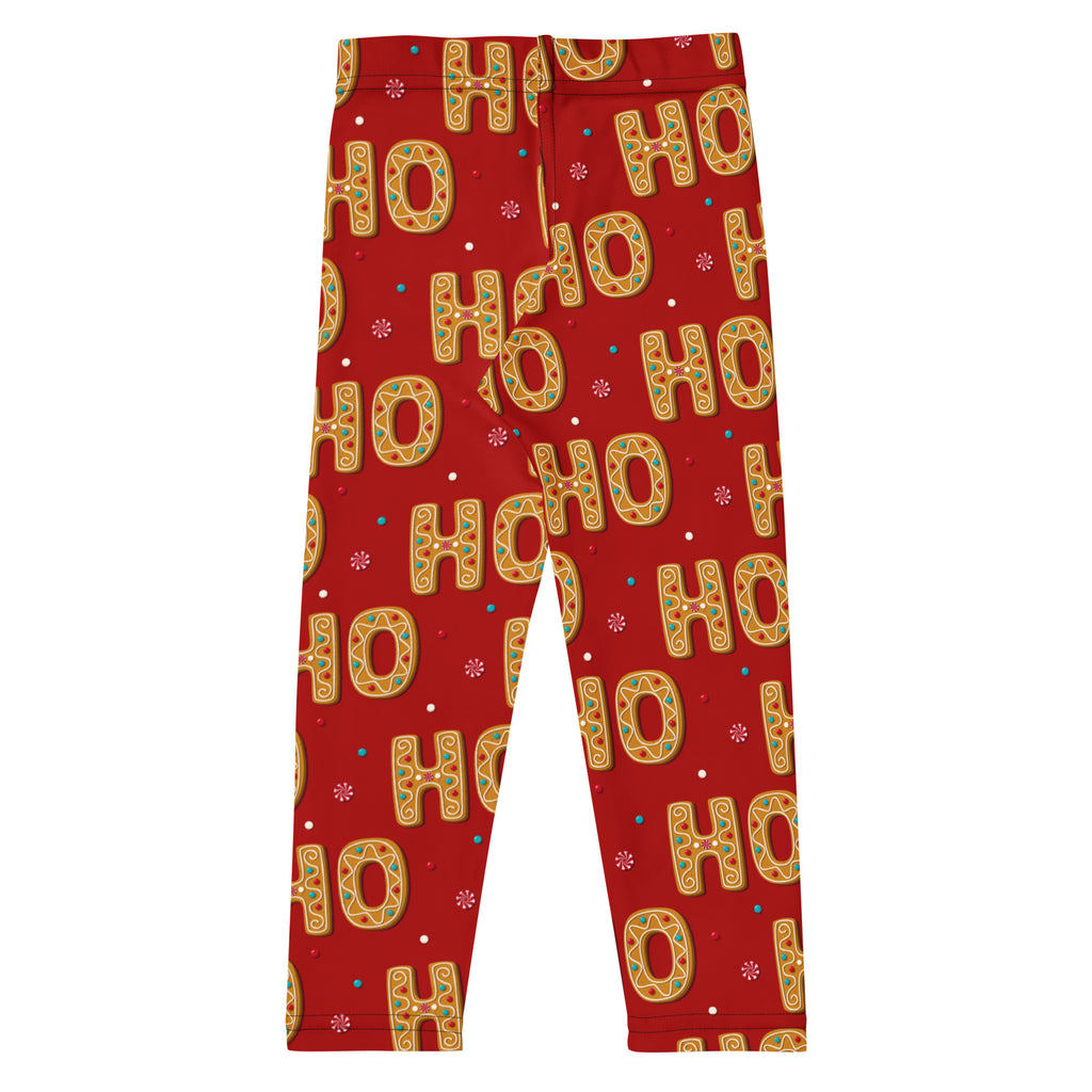 Girls gingerbread ho ho ho Christmas buttery soft red leggings with golden ho ho cookie pattern and green and blue accents