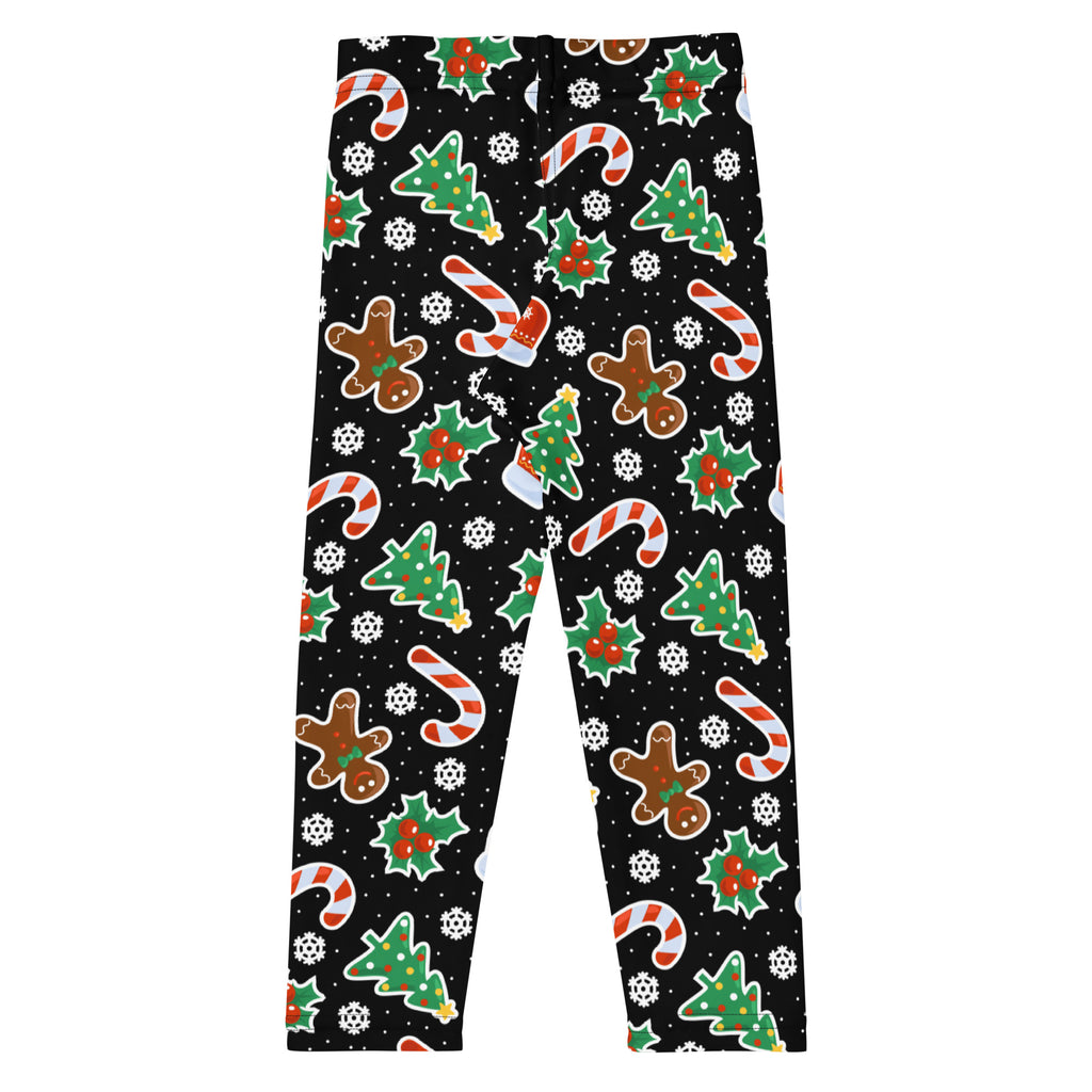 Kids gingerbread themed christmas buttery soft black leggings with festive white green and brown holiday patterns