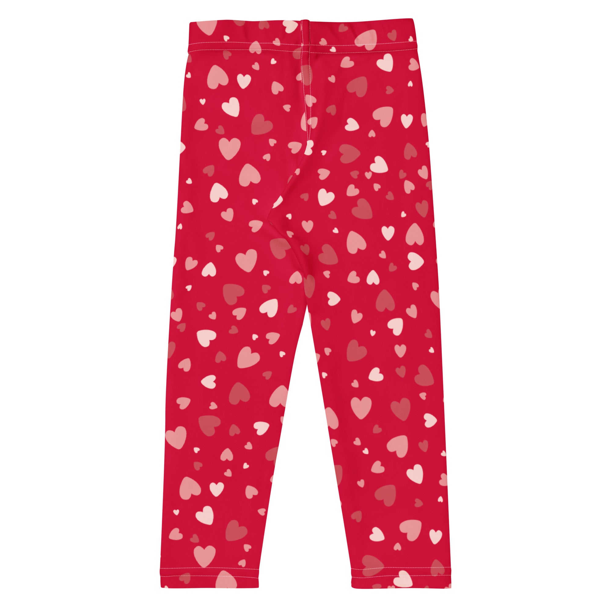 Girls red heart print buttery soft leggings with stretchy fabric and pink and white hearts scattered across design